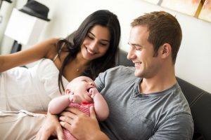 happy couple adopts baby